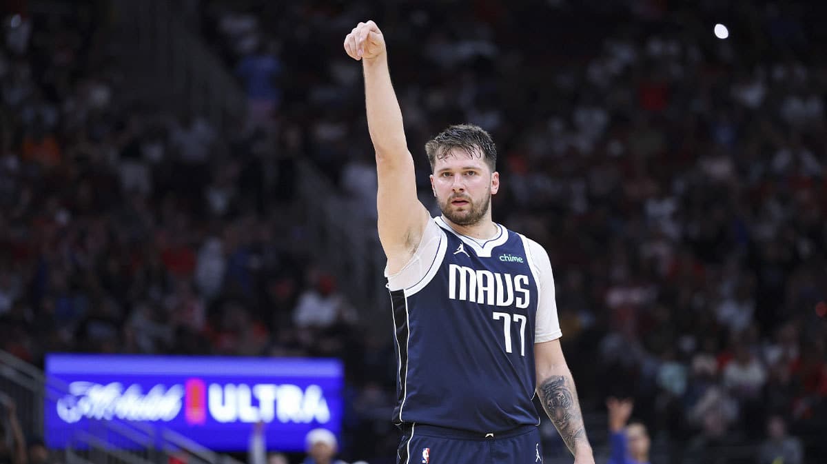 Dallas Mavericks guard Luka Doncic (77) reacts after scoring a basket during the third quarter against the Houston Rockets at Toyota Center.