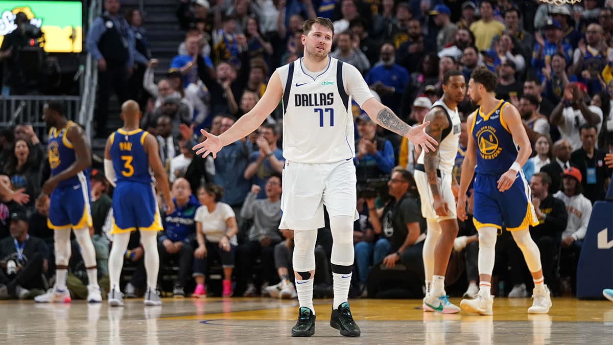 Dallas Mavericks guard Luka Doncic (77) reacts after the Mavericks missed a three point attempt late in the fourth quarter against the Golden State Warriors at the Chase Center.
