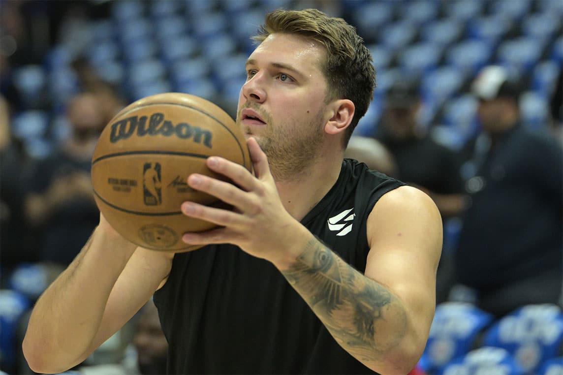 Dallas Mavericks guard Luka Doncic (77) warms up prior to game one of the first round for the 2024 NBA playoffs against the Los Angeles Clippers at Crypto.com Arena. 