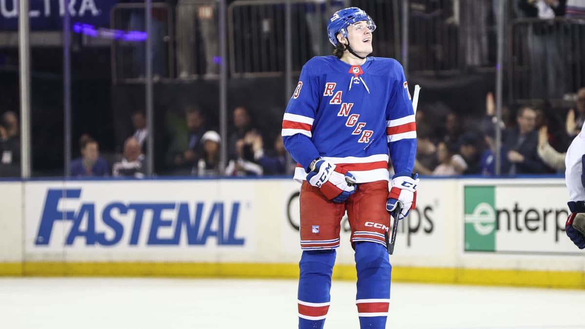 New York Rangers center Matt Rempe (73) looks at the scoreboard after scoring a goal in the second period against the Washington Capitals in game one of the first round of the 2024 Stanley Cup Playoffs at Madison Square Garden.