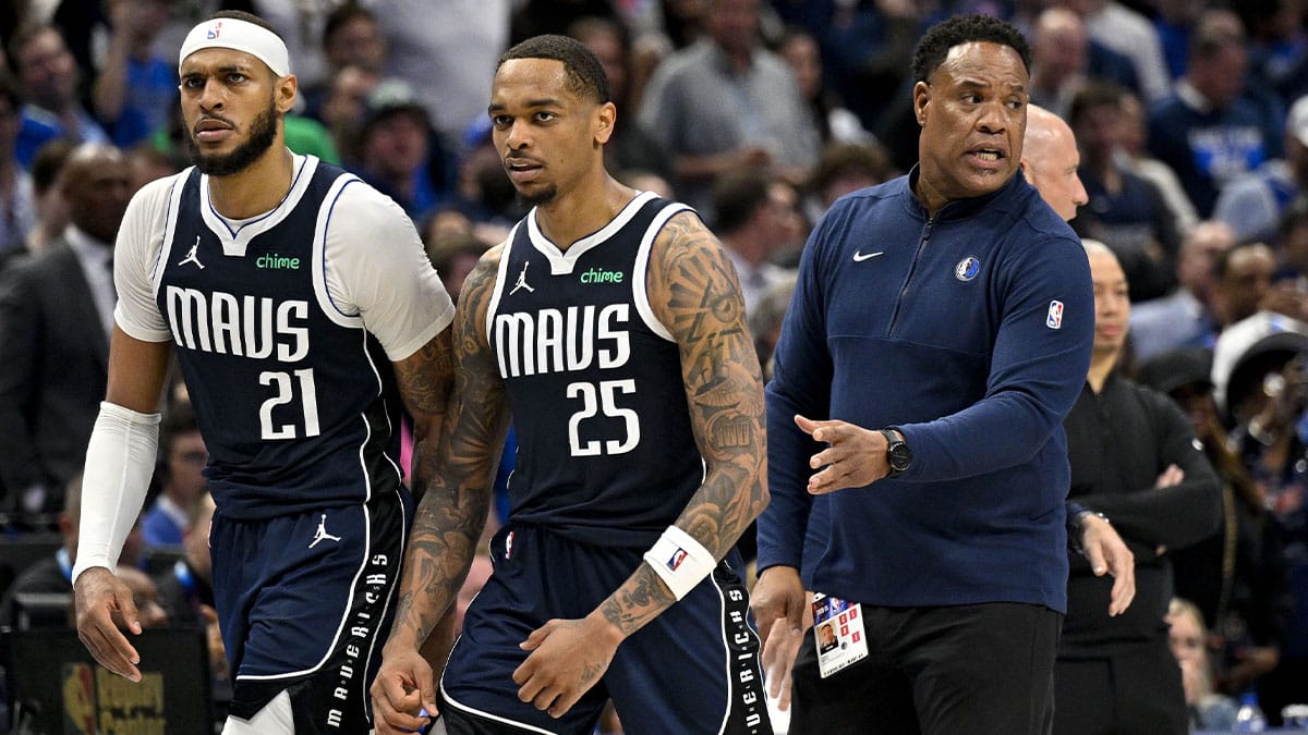 Dallas Mavericks forward P.J. Washington (25) and center Daniel Gafford (21) come off the court during the fourth quarter against the LA Clippers during game three of the first round for the 2024 NBA playoffs at the American Airlines Center.