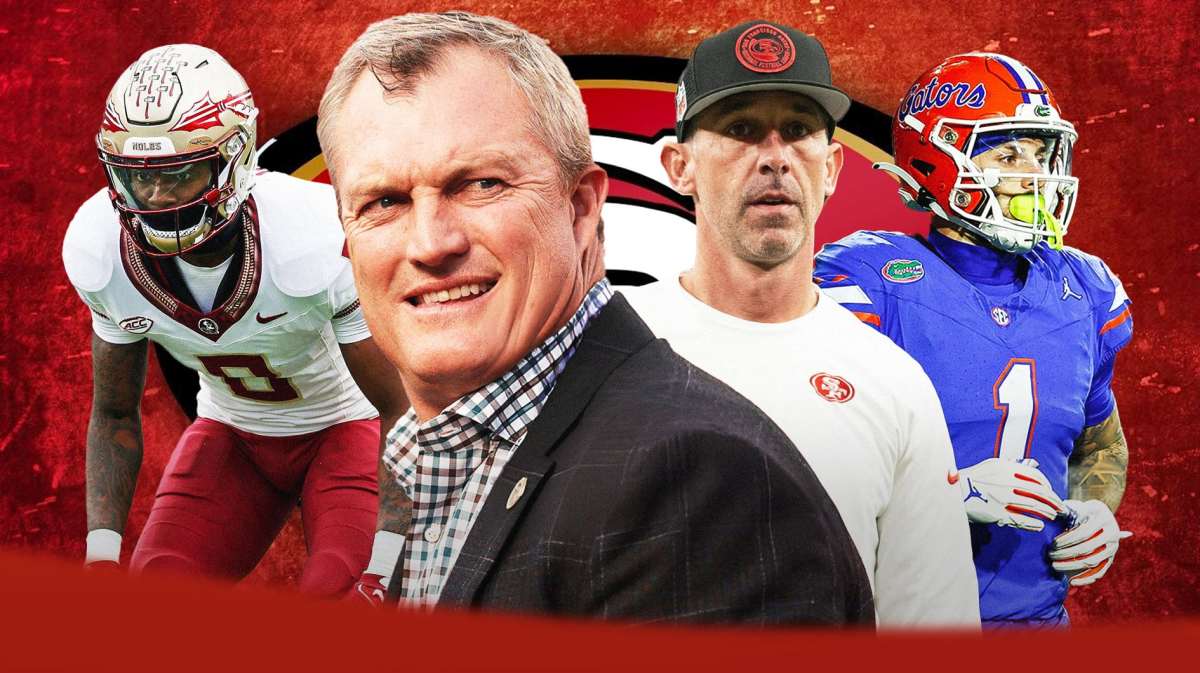 John Lynch in the middle, Ricky Pearsall, Renardo Green, Coach Kyle Shanahan around him, San Francisco 49ers wallpaper in the background
