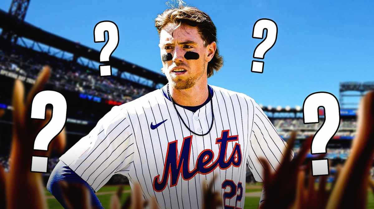 Mets third baseman Brett Baty with question marks next to him, Citi Field in back