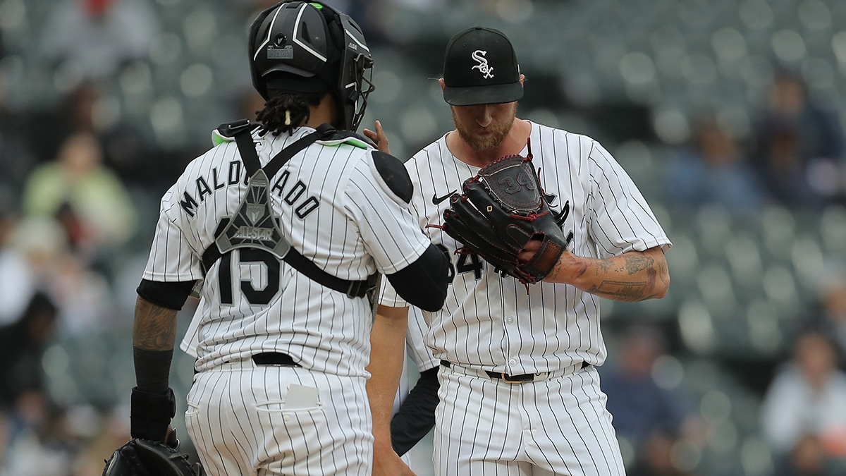 Chicago White Sox catcher Martín Maldonado (15) chats with Chicago White Sox relief pitcher Michael Kopech (34) in the eight inning during game one of a double header against the Kansas City Royals at Guaranteed Rate Field.