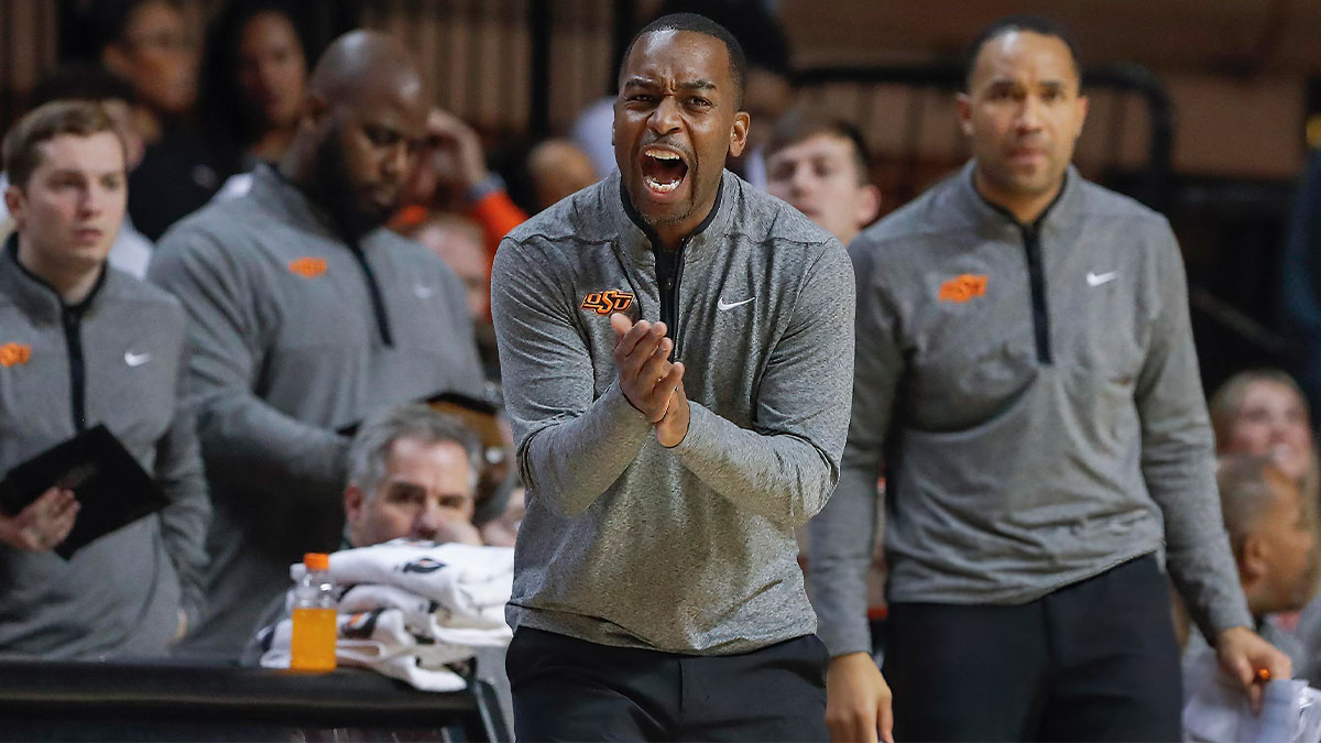 Oklahoma State Cowboys head coach Mike Boynton Jr. gestures to his team on a play against the West Virginia Mountaineers during the second half at Gallagher-Iba Arena. Oklahoma State won 67-60.
