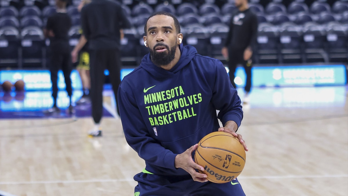 Minnesota Timberwolves guard Mike Conley (10) warms up before the game against the Utah Jazz