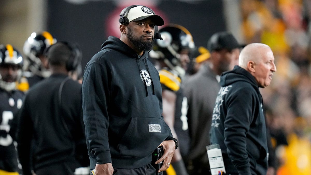 Pittsburgh Steelers head coach Mike Tomlin watches a replay in the second quarter of the NFL 16 game between the Pittsburgh Steelers and the Cincinnati Bengals at Acrisure Stadium