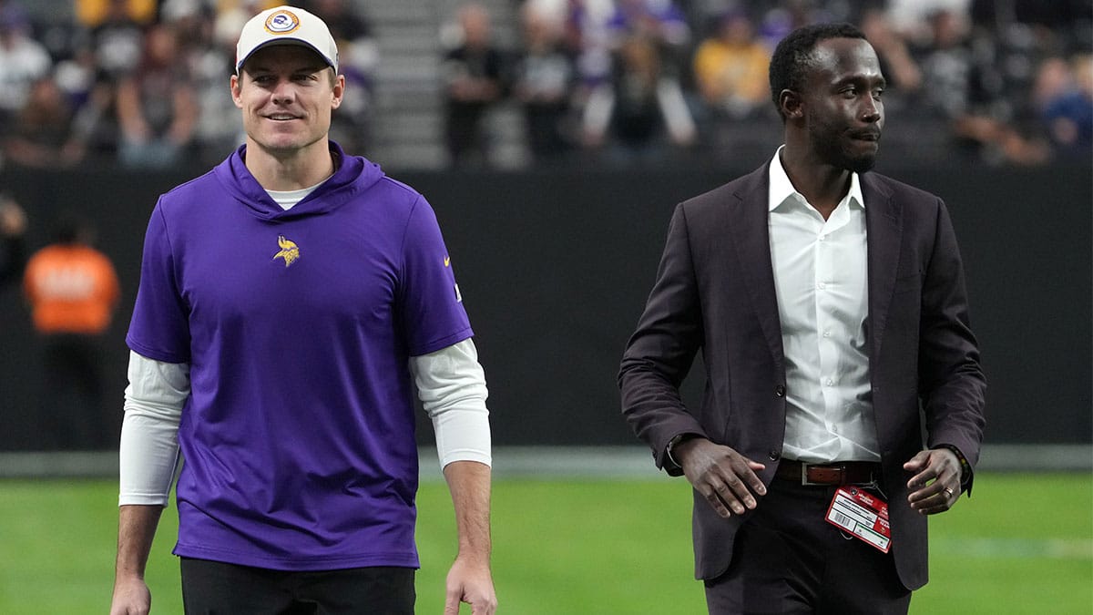 Minnesota Vikings coach Kevin O'Connell (left) and general manager Kwesi Adofo-Mensah react during the game against the Minnesota Vikings at Allegiant Stadium.