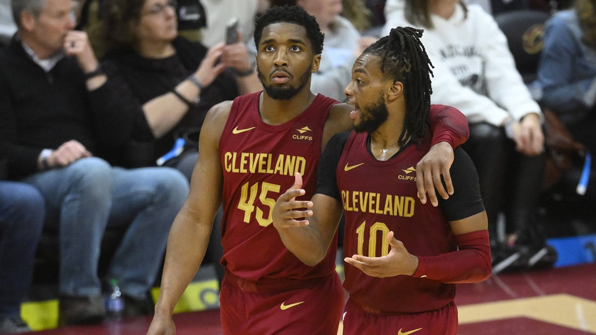 Cleveland Cavaliers guard Donovan Mitchell (45) and guard Darius Garland (10) talk in the fourth quarter against the Indiana Pacers at Rocket Mortgage FieldHouse. 