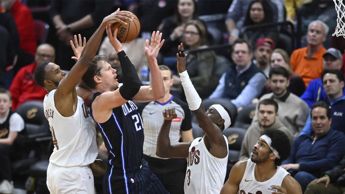 Mo Wagner getting blocked by Evan Mobley in a Cavaliers vs. Magic matchup