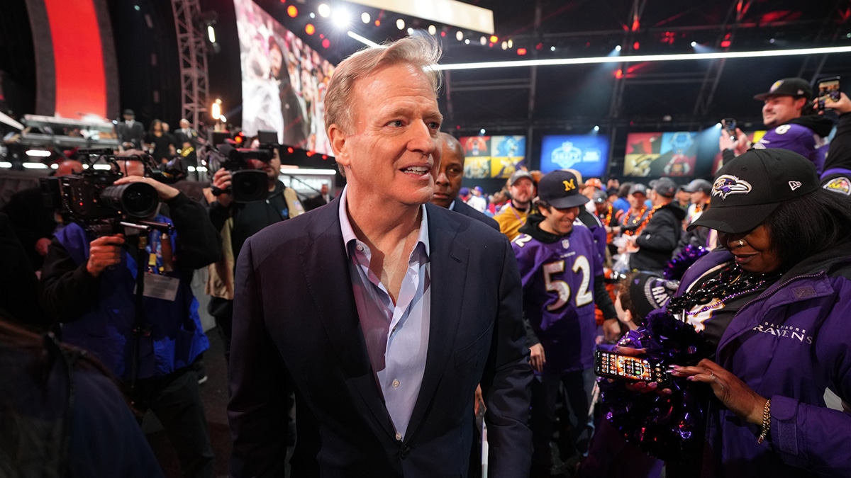NFL commissioner Roger Goodell walks through the crowd during the 2024 NFL Draft at Campus Martius Park and Hart Plaza.