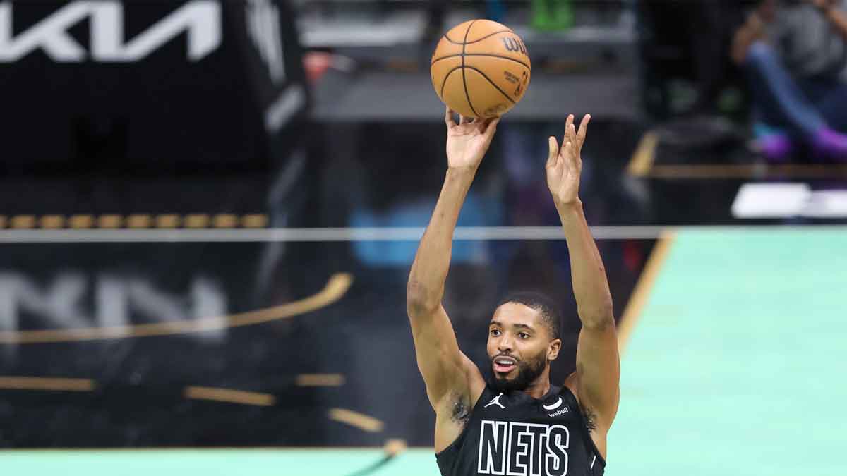 Brooklyn Nets forward Mikal Bridges (1) shoots for a three point shot against the Charlotte Hornets during the second quarter at Spectrum Center