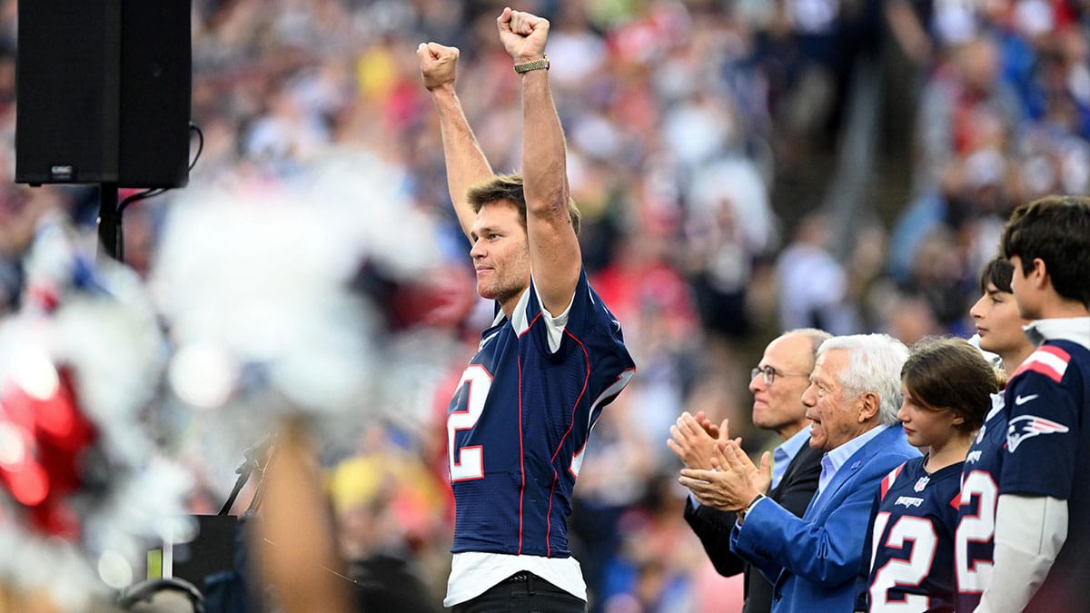New England Patriots former quarterback Tom Brady gestures during a halftime ceremony in his honor during the game between the Philadelphia Eagles and New England Patriots at Gillette Stadium.