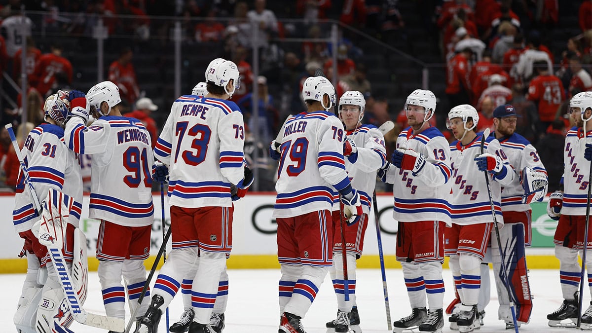  New York Rangers goaltender Igor Shesterkin (31) celebrates with teammates after their game against the Washington Capitals in game three of the first round of the 2024 Stanley Cup Playoffs at Capital One Arena.