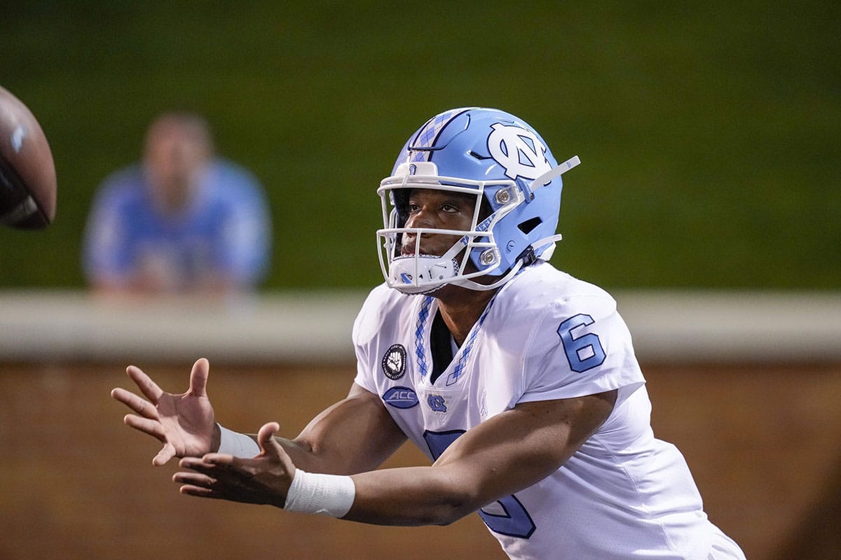 North Carolina Tar Heels quarterback Jacolby Criswell (6) makes a catch during warm ups before the start of the first half against the Wake Forest Demon Deacons at Truist Field.