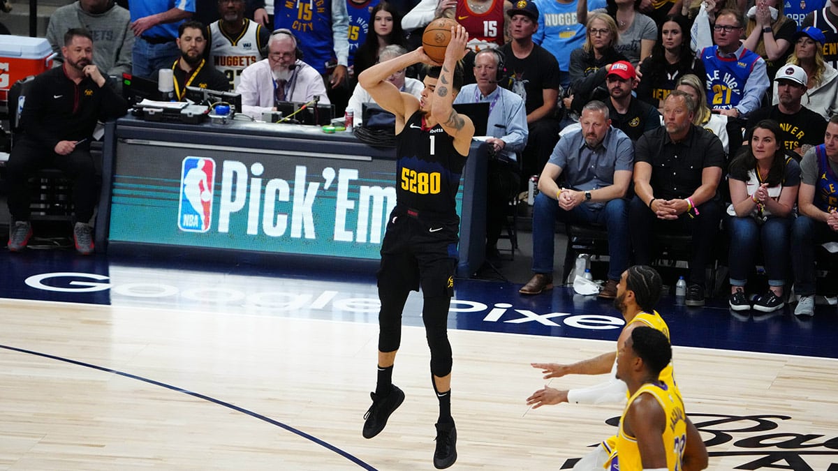 Denver Nuggets forward Michael Porter Jr. (1) shoots the ball in the second half against the Los Angeles Lakers during game two during the 2024 NBA playoffs at Ball Arena.