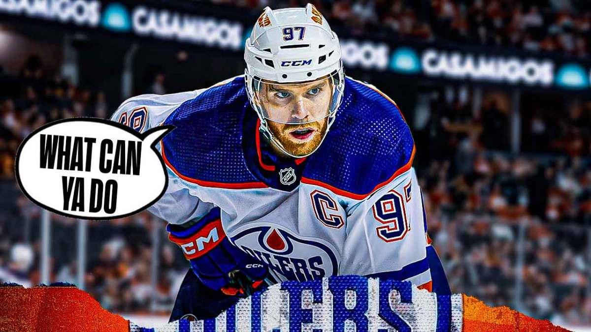 Photo: Connor McDavid looking serious in Oilers jersey saying "What can ya do"
