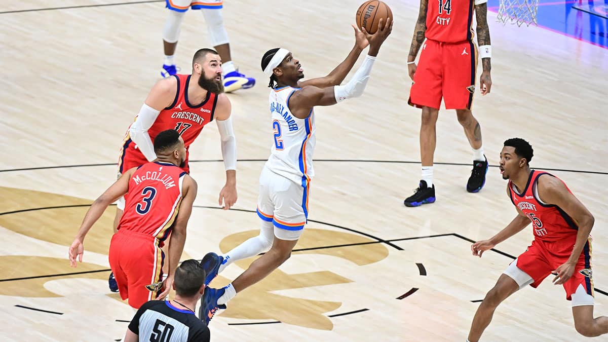 Apr 27, 2024; New Orleans, Louisiana, USA; Oklahoma City Thunder Guard Shai Gilgeous-Alexander (2) goes up for a shot against the New Orleans Pelicans during the first quarter of game three of the first round for the 2024 NBA playoffs at Smoothie King Center. Mandatory Credit: Matt Bush-USA TODAY Sports