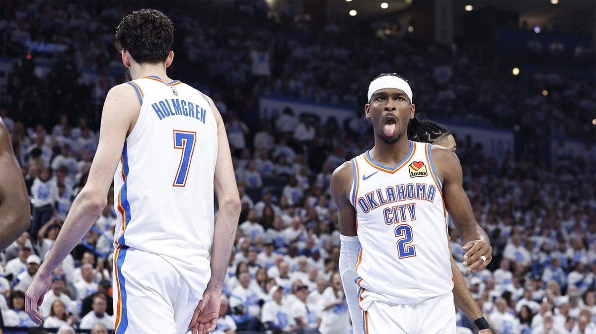 Oklahoma City Thunder guard Shai Gilgeous-Alexander (2) reacts to forward Chet Holmgren (7) blocking a shot by a New Orleans Pelicans player during the second quarter of game one of the first round for the 2024 NBA playoffs at Paycom Center.