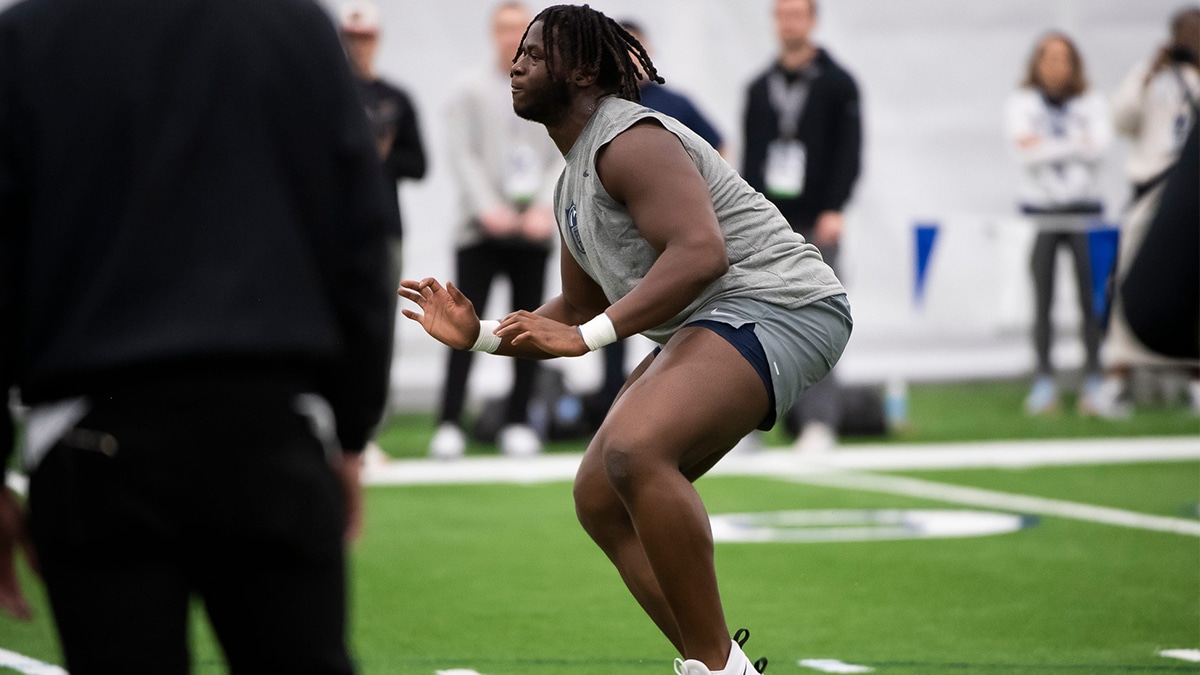 Offensive tackle Olu Fashanu participates in a lineman drill during Penn State's Pro Day in Holuba Hall on March 15, 2024, in State College.