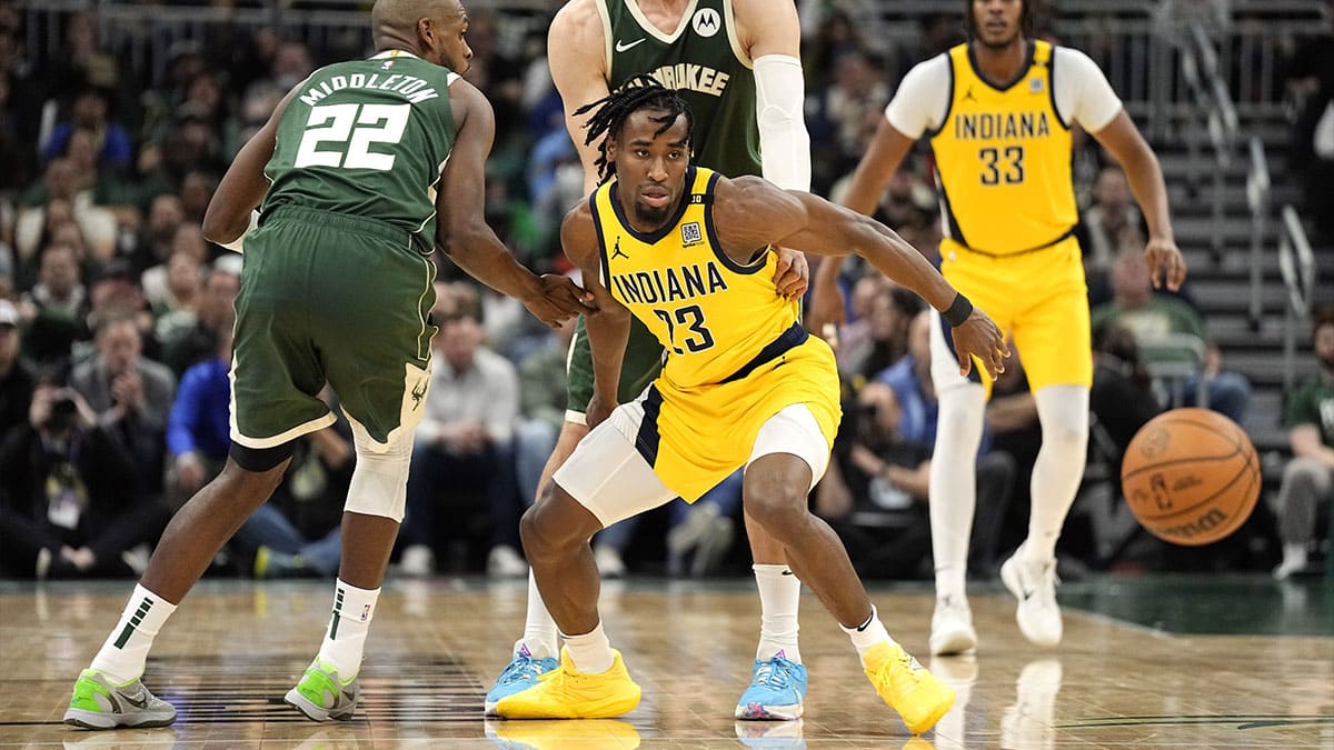Indiana Pacers forward Aaron Nesmith (23) looks towards the loose ball during the fourth quarter against the Milwaukee Bucks during game five of the first round for the 2024 NBA playoffs at Fiserv Forum.