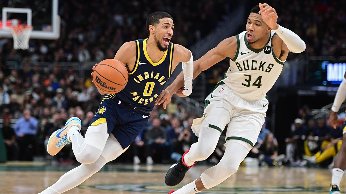  Indiana Pacers guard Tyrese Haliburton (0) drives for the basket against Milwaukee Bucks forward Giannis Antetokounmpo (34) in the second quarter at Fiserv Forum
