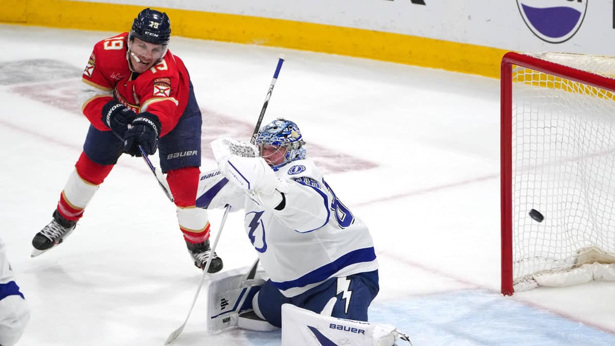 Florida Panthers left wing Matthew Tkachuk (19) tips the puck wide of Tampa Bay Lightning goaltender Andrei Vasilevskiy (88) during the second period in game five of the first round of the 2024 Stanley Cup Playoffs at Amerant Bank Arena.