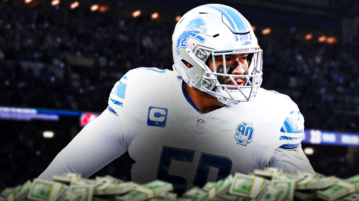 Penei Sewell with a bunch of money falling around him