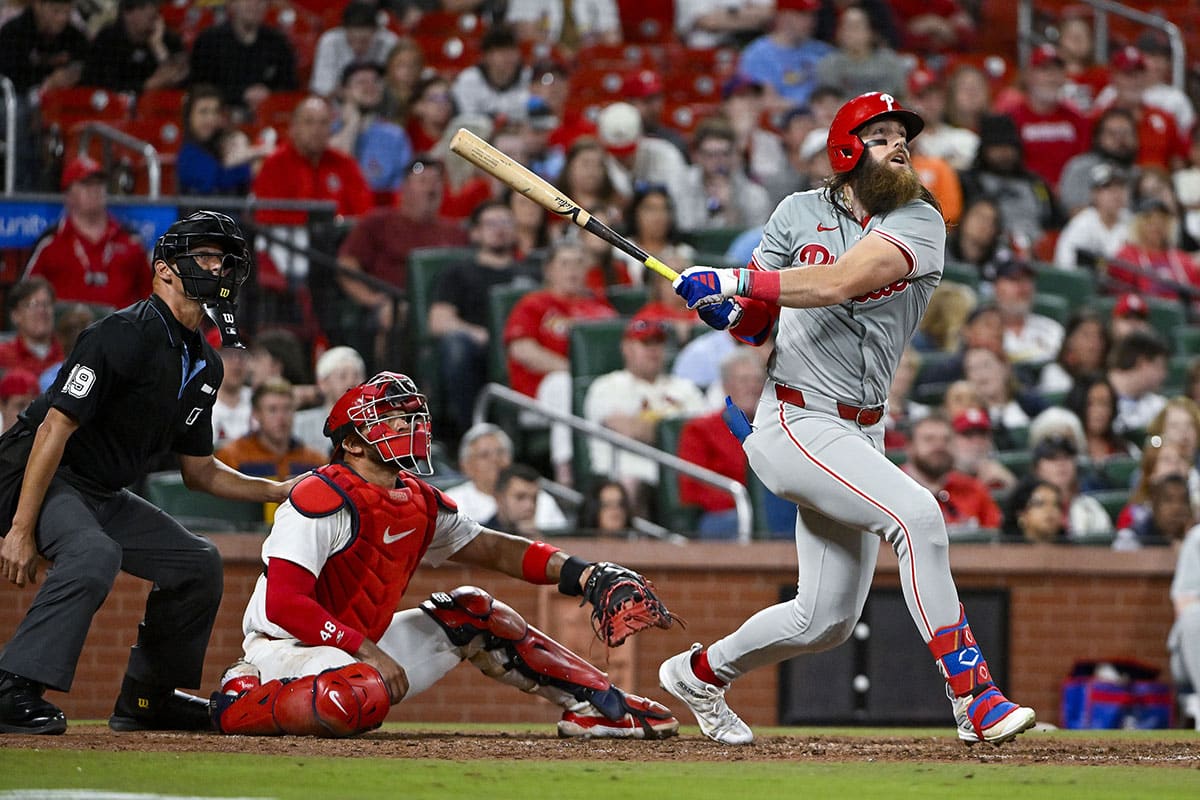 Philadelphia Phillies left fielder Brandon Marsh (16) hits a solo home run against the St. Louis Cardinals during the ninth inning at Busch Stadium.