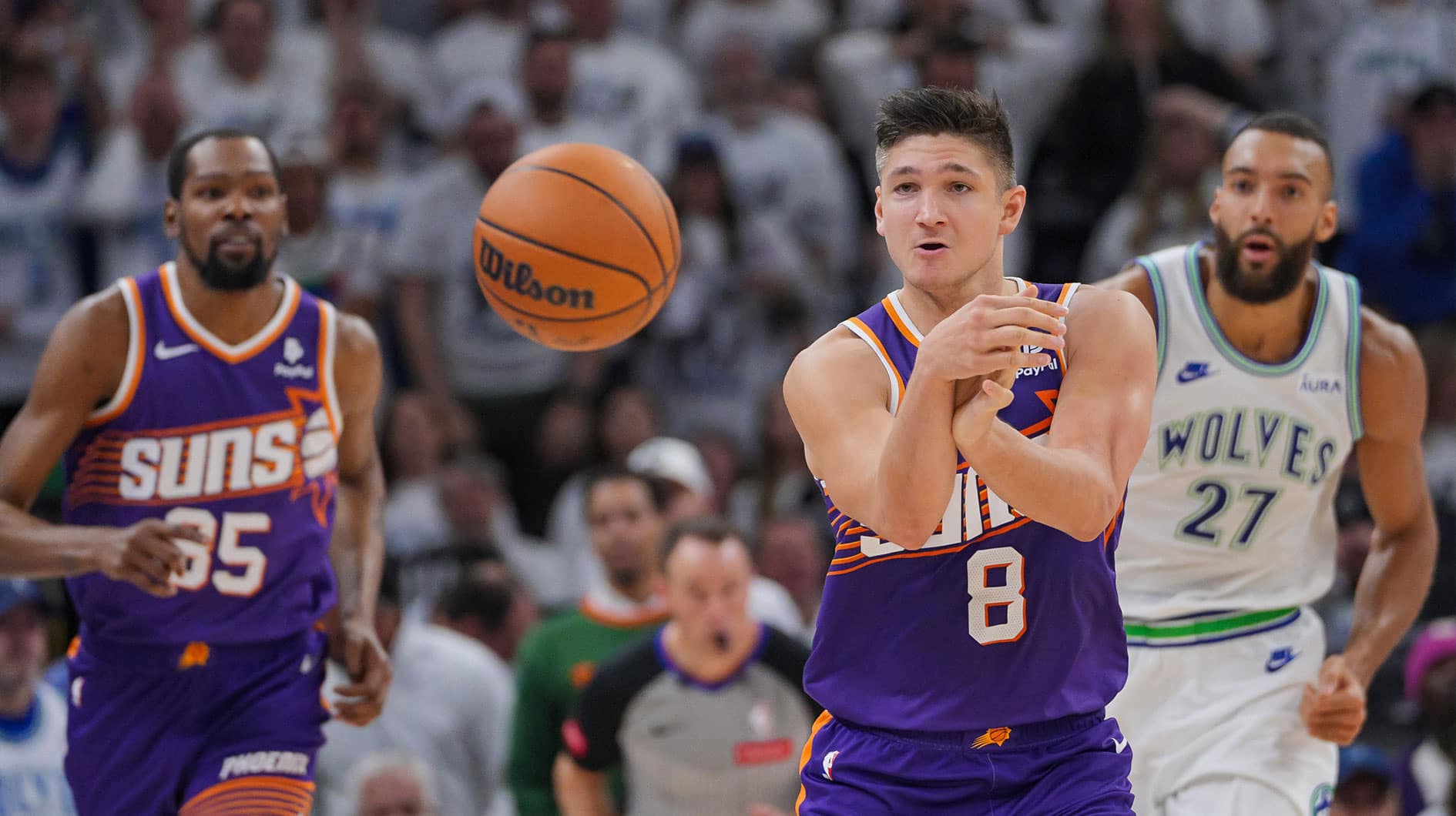Apr 23, 2024; Minneapolis, Minnesota, USA; Phoenix Suns guard Grayson Allen (8) passes against the Minnesota Timberwolves in the second quarter during game two of the first round for the 2024 NBA playoffs at Target Center. Mandatory Credit: Brad Rempel-USA TODAY Sports