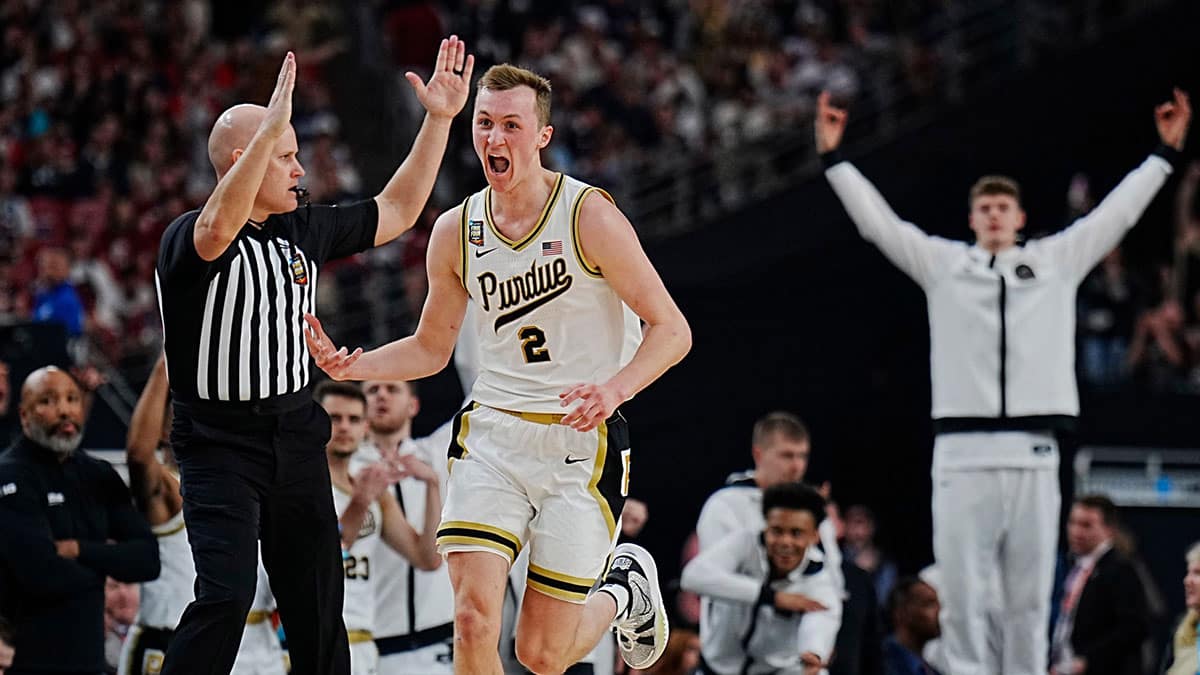 Purdue guard Fletcher Loyer (2) celebrates after a three point basket against North Carolina State during the Final Four semifinal game at State Farm Stadium.
