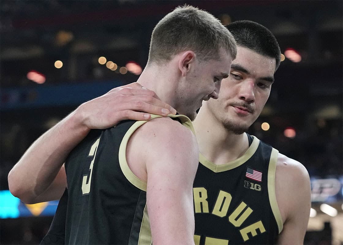 Purdue Boilermakers guard Braden Smith (3) and Purdue Boilermakers center Zach Edey (15) comfort each other after the NCAA Men’s Basketball Tournament Championship against the Connecticut Huskies, Monday, April 8, 2024, at State Farm Stadium in Glendale, Ariz. Connecticut Huskies won 75-60.
