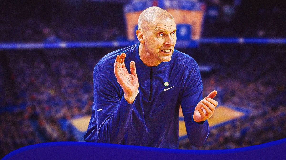 BYU coach Mark Pope stands in front of Kentucky basketball crowd, John Calipari sits on sideline