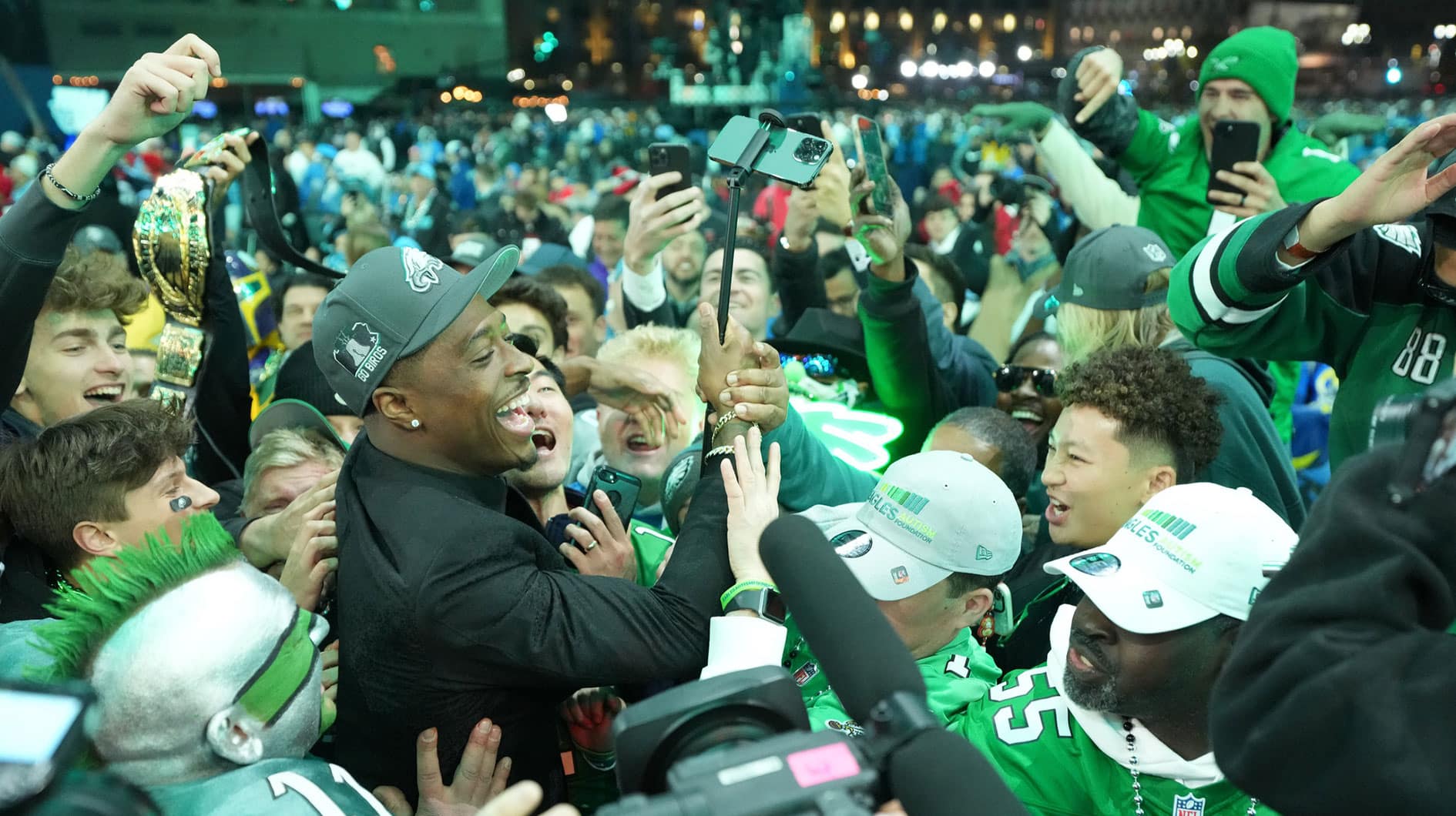 Apr 25, 2024; Detroit, MI, USA; Toledo Rockets cornerback Quinyon Mitchell poses with fans after being selected by the Philadelphia Eagles as the No. 22 pick in the first round of the 2024 NFL Draft at Campus Martius Park and Hart Plaza. Mandatory Credit: Kirby Lee-USA TODAY Sports