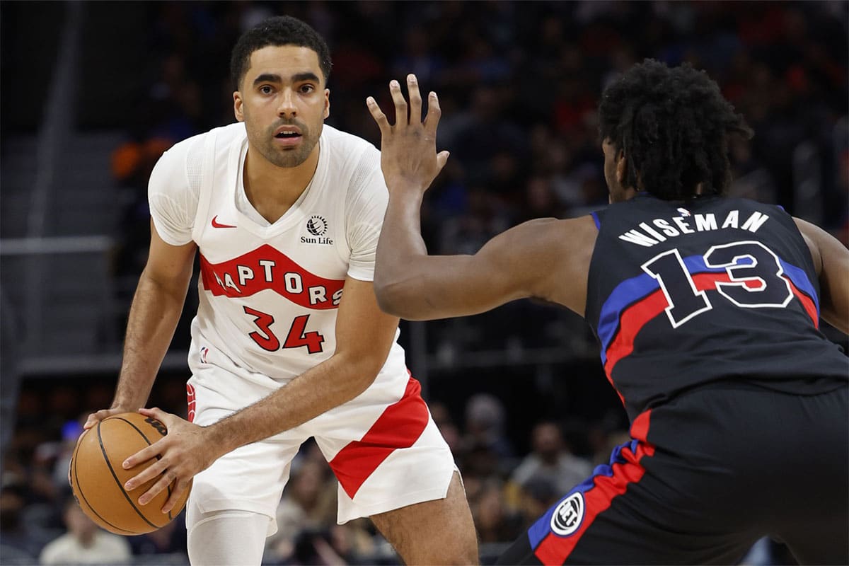 Toronto Raptors center Jontay Porter (34) is defended by Detroit Pistons center James Wiseman (13) in the second half at Little Caesars Arena.
