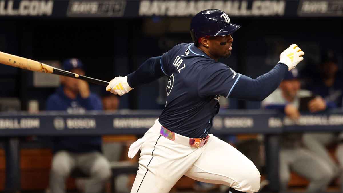 Tampa Bay Rays first baseman Yandy Diaz (2) hits a RBI single during the third inning against the Texas Rangers at Tropicana Field.