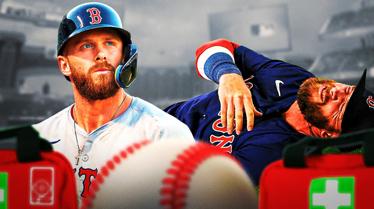 Photo: Trevor Story looking like he's in pain in Red Sox jersey