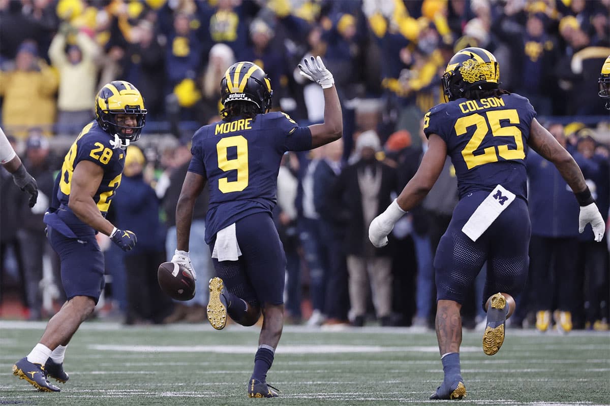 Michigan Wolverines defensive back Rod Moore (9) celebrates after he makes an interception in the second half against the Ohio State Buckeyes at Michigan Stadium. 