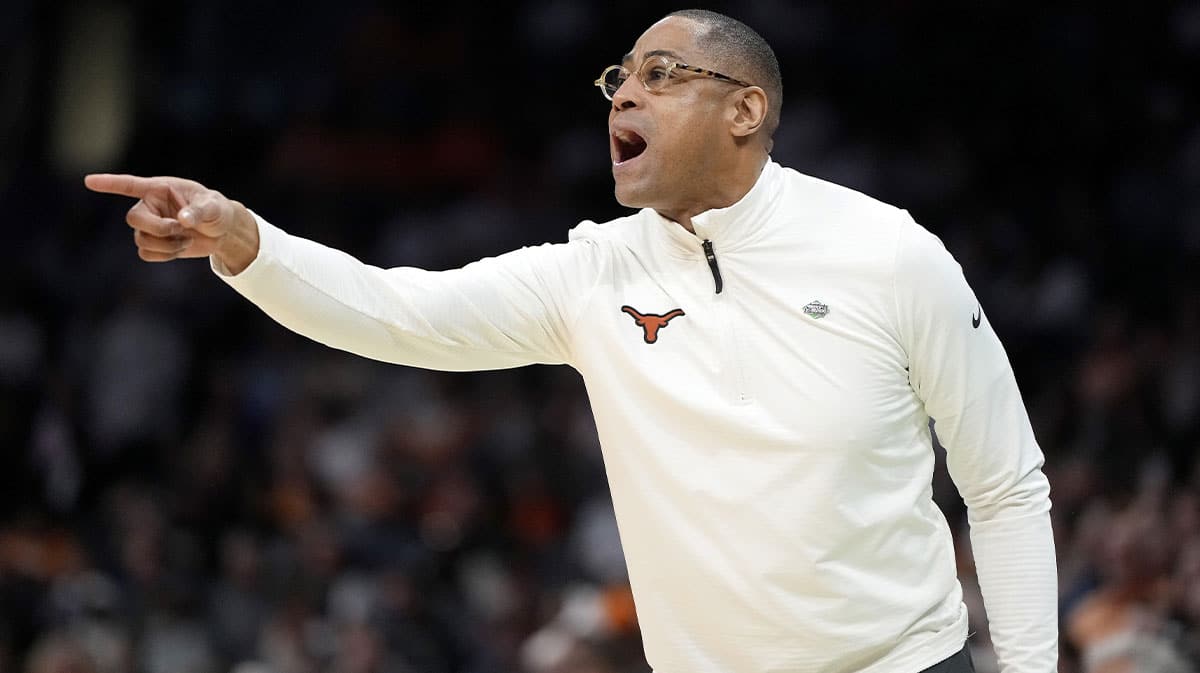 Texas Longhorns head coach Rodney Terry calls to his team in the first half of the first round of the 2024 NCAA Tournament at Spectrum Center.