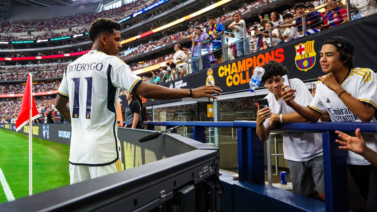 Real Madrid fans throw a water bottle to Real Madrid forward Rodrygo (11) during the match against FC Barcelona at AT&T Stadium