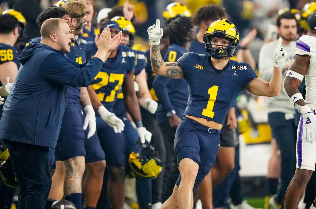 Michigan wide receiver Roman Wilson celebrates a play during the first quarter of the College Football Playoff national championship game against Washington