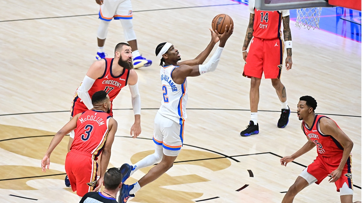 Oklahoma City Thunder Guard Shai Gilgeous-Alexander (2) goes up for a shot against the New Orleans Pelicans during the first quarter of game three of the first round for the 2024 NBA playoffs at Smoothie King Center.