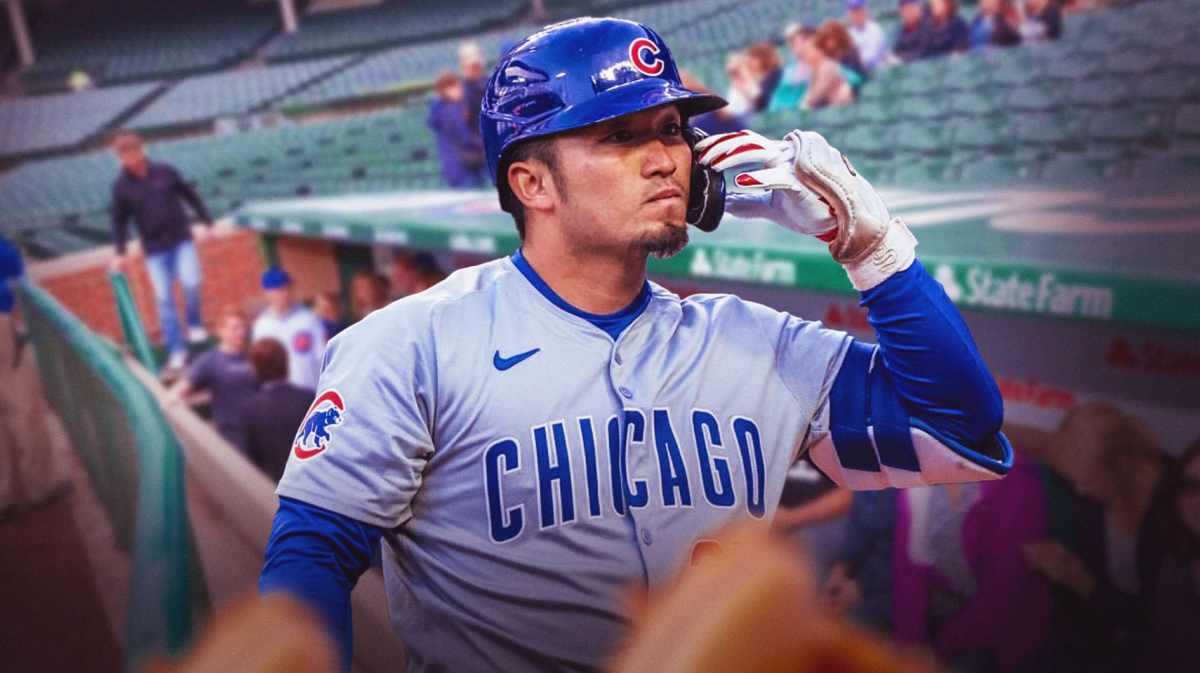 Cubs' Seiya Suzuki in an MLB dugout looking serious/upset.