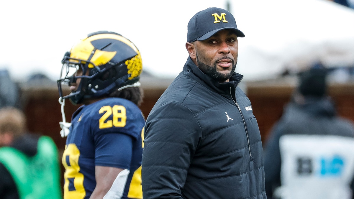 Michigan head coach Sherrone Moore watches a play during the second half of the spring game at Michigan Stadium