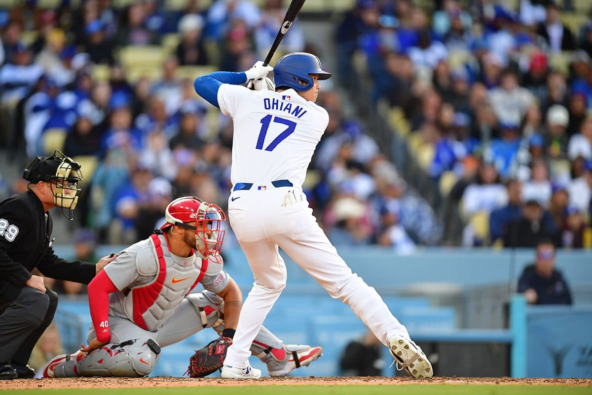 Los Angeles Dodgers designated hitter Shohei Ohtani (17) hits against the St. Louis Cardinals during the sixth inning at Dodger Stadium.
