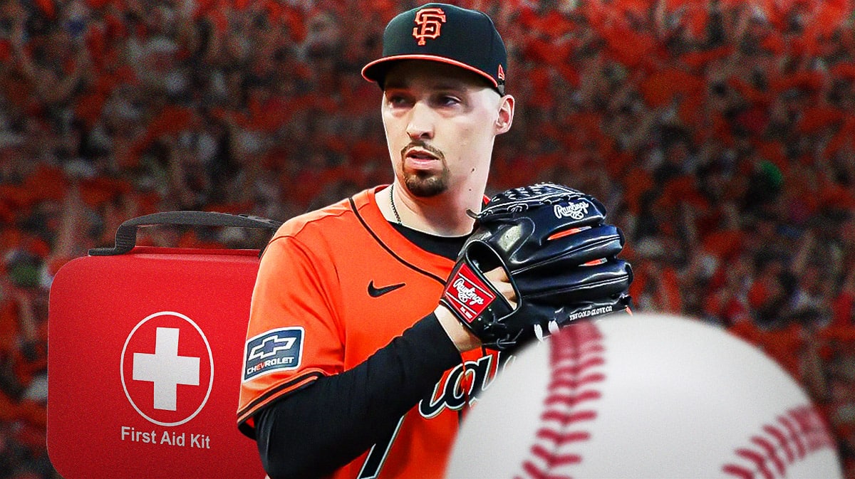 Blake Snell in Giants jersey in action with medical kit beside him.
