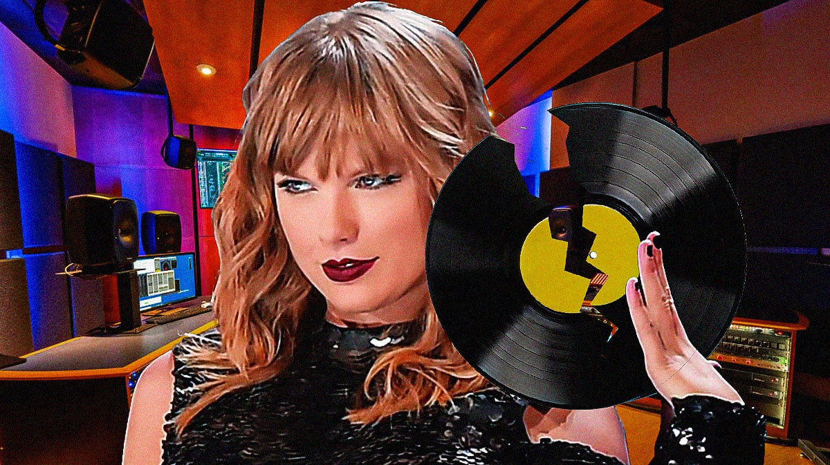 Taylor Swift holding a vinyl record and literally shattering it
