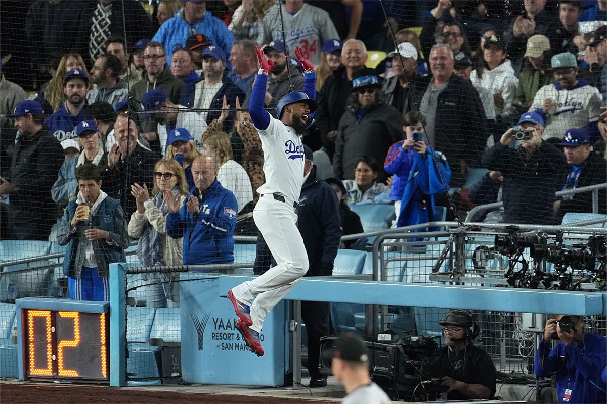 Los Angeles Dodgers right fielder Teoscar Hernandez (37) celebrates after hitting a home run in the sixth inning against San Francisco Giants relief pitcher Tyler Rogers (71) at Dodger Stadium.
