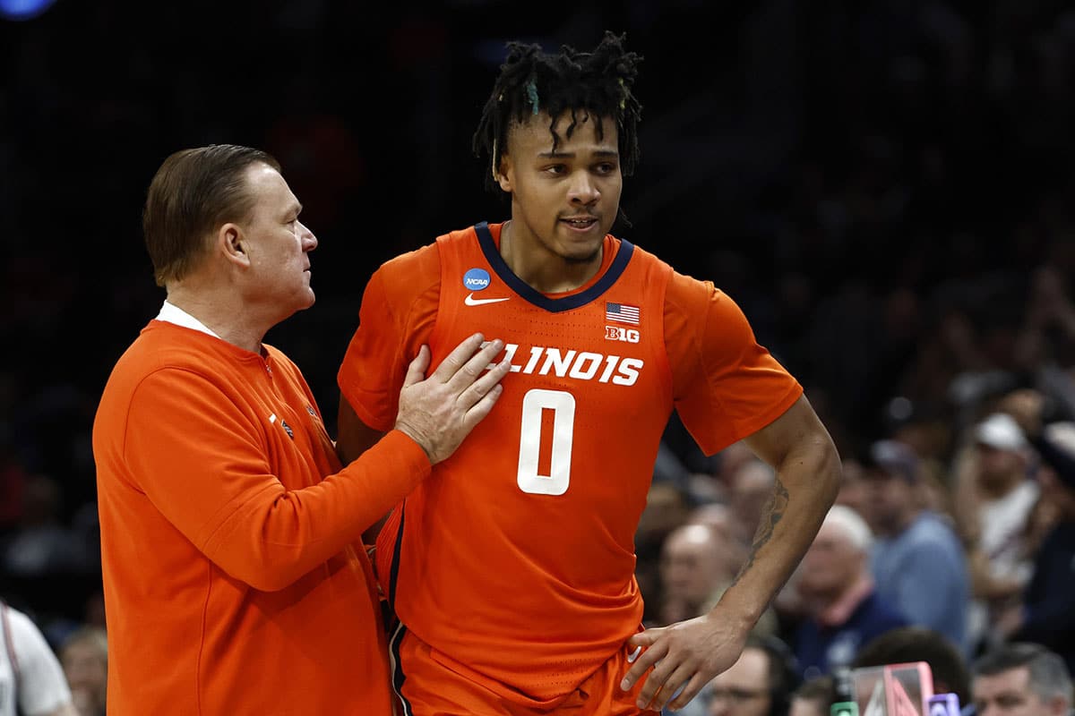 llinois Fighting Illini head coach Brad Underwood reacts with guard Terrence Shannon Jr. (0) against the Connecticut Huskies in the finals of the East Regional of the 2024 NCAA Tournament at TD Garden. 