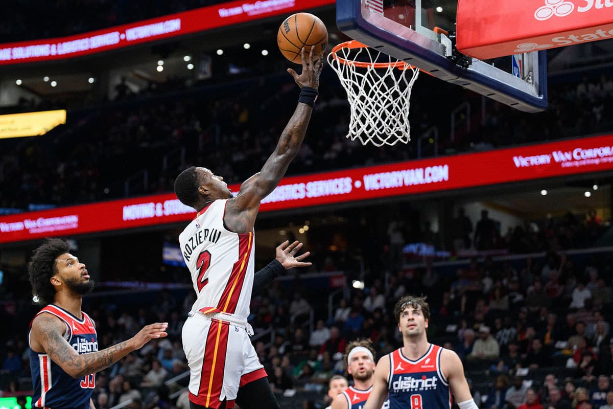 Miami Heat guard Terry Rozier (2) shoots a layup over Washington Wizards forward Marvin Bagley III (35) during the first quarter at Capital One Arena.